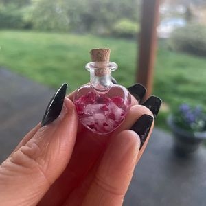 Self- love Crystal-infused essential oil mini spell jar.